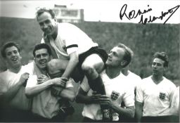 Ronnie Clayton and England Signed 12 x 8 inch football photo. Good Condition. All signed pieces come