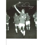 Football Paul Reaney 10x8 Signed B/W Photo Pictured Celebrating With His Leeds Team Mates After