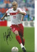 Hasan Sas Turkey 12 x 8 signed colour photo. Good Condition. All signed pieces come with a