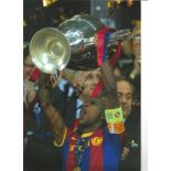 Eric Abidal Barcelona Signed 12 x 8 inch football photo. Good Condition. All signed pieces come with