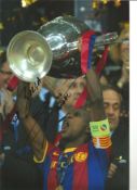 Eric Abidal Barcelona Signed 12 x 8 inch football photo. Good Condition. All signed pieces come with