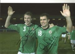 Johnny Evans and Aaron Hughes Northern Ireland Signed 12 x 8 inch football photo. Good Condition.