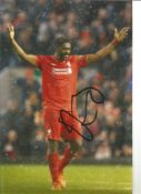 Kolo Touré Liverpool Signed 10 x 8 inch football photo. Good Condition. All signed pieces come