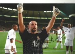 Fabien Barthez France Signed 12 x 8 inch football photo. Good Condition. All signed pieces come with