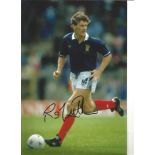 Roy Aitken Scotland Signed 10 x 8 inch football photo. Good Condition. All signed pieces come with a