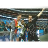 Jordi Gomez, Louis Robles and Roman Golobart Wigan Signed 12 x 8 inch football photo. Good