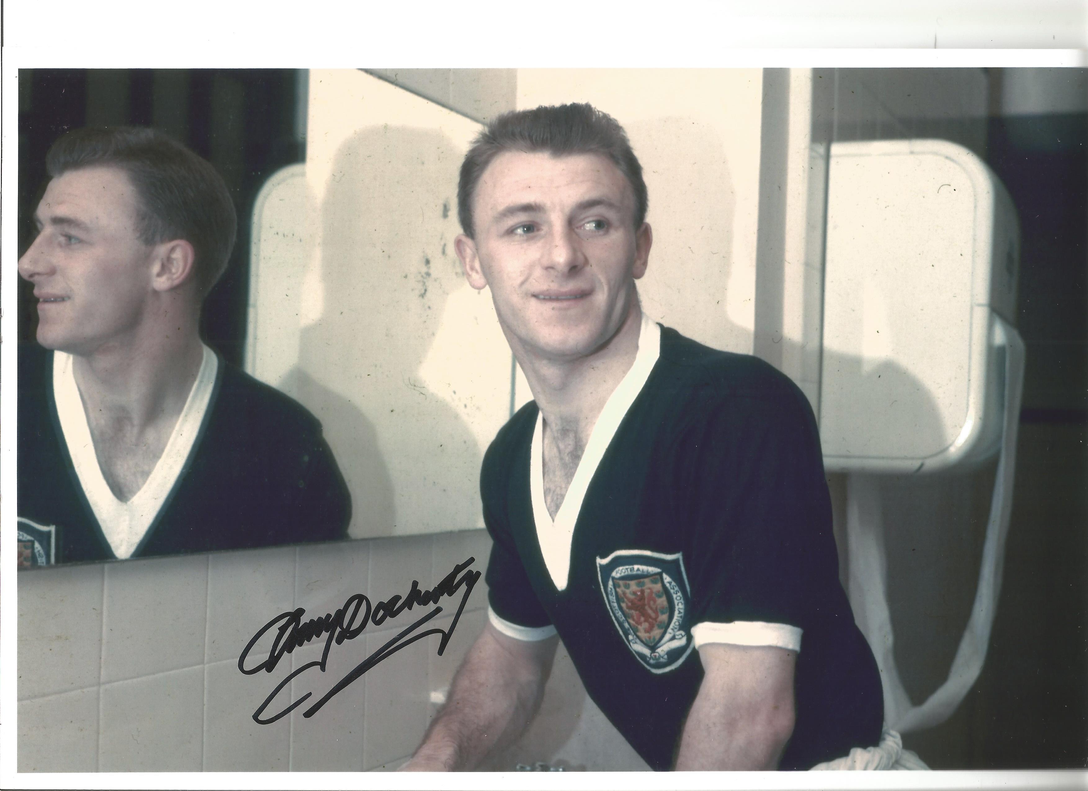 Tommy Docherty Scotland Signed 12 x 8 inch football photo. Good Condition. All signed pieces come