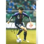 Shinji Kagawa Japan Signed 12 x 8 inch football photo. Good Condition. All signed pieces come with a