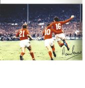 Martin Peters 66 England Signed 12 x 8 inch football photo. Good Condition. All signed pieces come