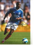 John Utaka Portsmouth Signed 12 x 8 inch football photo. Good Condition. All signed pieces come with