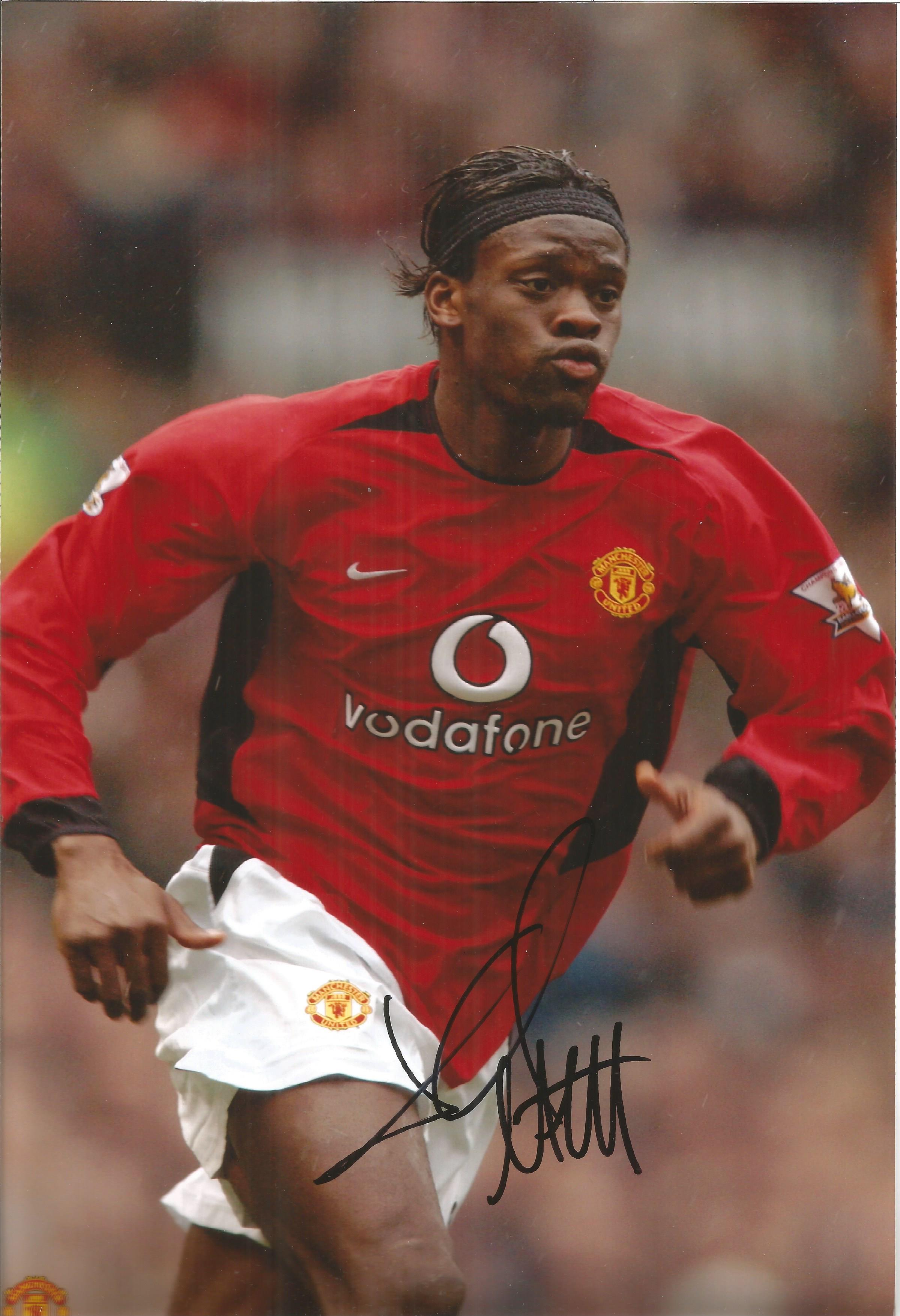 Football Louis Saha 10x8 signed colour photo in action for Manchester United. Good Condition. All