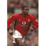 Football Louis Saha 10x8 signed colour photo in action for Manchester United. Good Condition. All