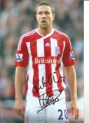 Mathew Upson Stoke Signed 10 x 8 inch football photo. Good Condition. All signed pieces come with