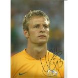 Vince Grella Australia Signed 12 x 8 inch football photo. Good Condition. All signed pieces come