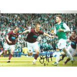 Danny Granger Hearts Signed 12 x 8 inch football photo. Good Condition. All signed pieces come