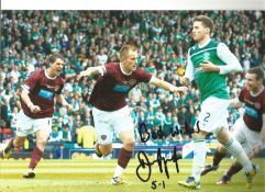 Danny Granger Hearts Signed 12 x 8 inch football photo. Good Condition. All signed pieces come