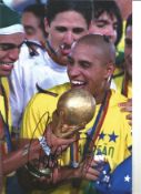 Roberto Carlos Brazil Signed 12 x 8 inch football photo. Good Condition. All signed pieces come with