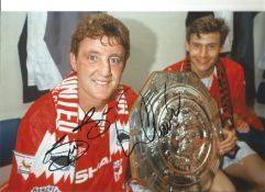 Andrei Kanchelskis and Steve Bruce Man United Signed 10 x 8 inch football photo. Good Condition. All
