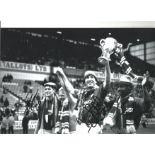 Richard Gough, Terry Butcher and Mark Walters Rangers Signed 12 x 8 inch football photo. Good