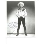 Roy Rogers signed 10 z 8 inch b/w photo to Randall, slight smudging to R but still rare. Good