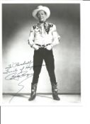 Roy Rogers signed 10 z 8 inch b/w photo to Randall, slight smudging to R but still rare. Good