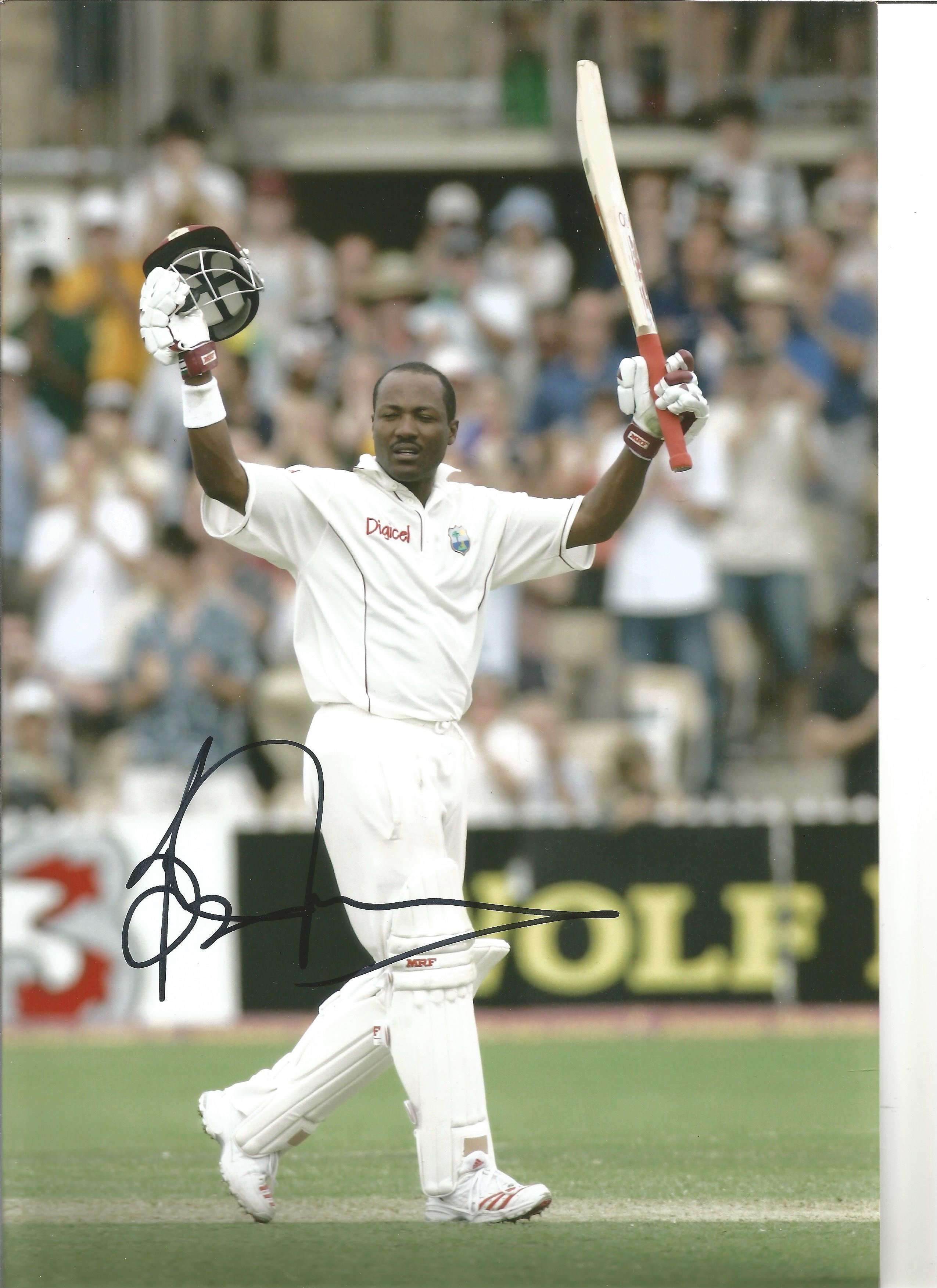 Cricket Brian Lara signed superb 12 x 8 inch colour batting photo. Good Condition. All signed pieces