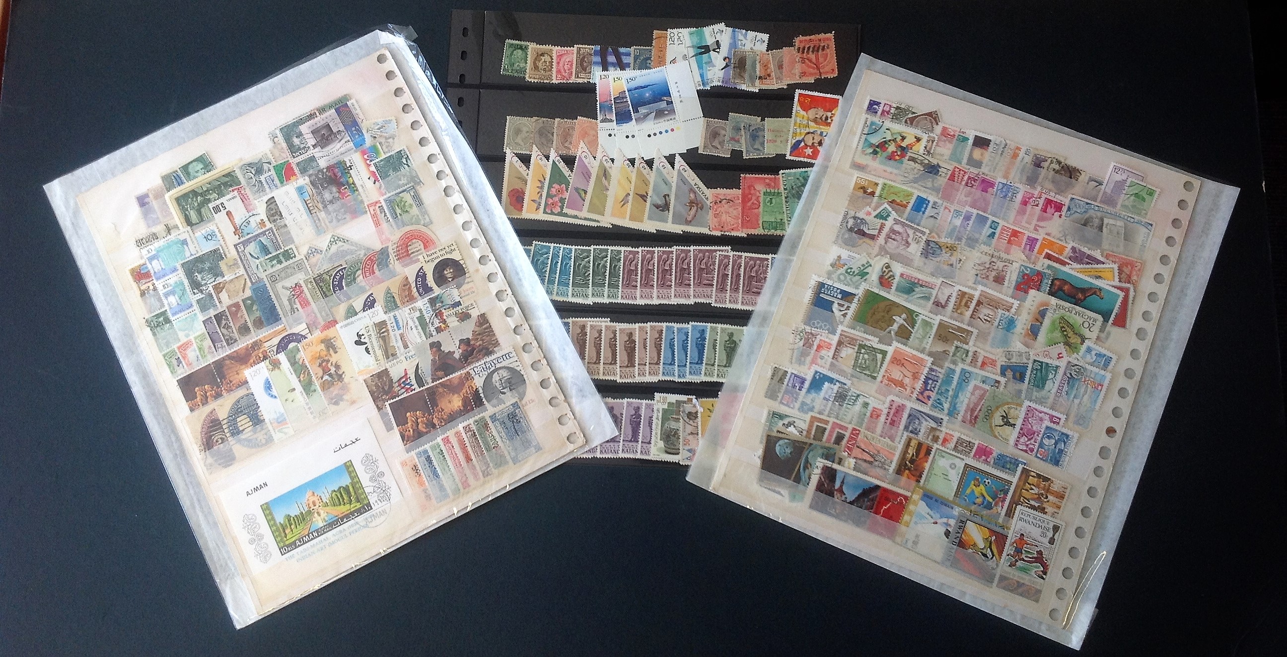 World stamp collection on 6 stocksheets. Mint and used. Good Condition. We combine postage on