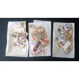 Assorted used stamp collection on backing paper. 3 bags, includes stamps from BCW, Foreign and GB.