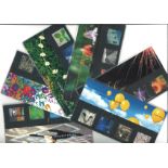 Royal mail millennium stamp presentation pack collections. 12 packs included for every month on