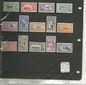 Falkland Island stamp collection on loose album page. Mainly mint. 22 stamps. Includes 1952 GVI