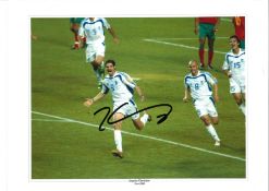 Angelos Charisteas Greece Signed 16 x 12 inch football photo. Good Condition. All signed pieces come