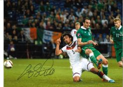 John O'Shea Germany Ireland Signed 16 x 12 inch football photo. Good Condition. All signed pieces