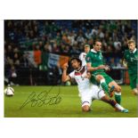 John O'Shea Germany Ireland Signed 16 x 12 inch football photo. Good Condition. All signed pieces