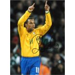 Robinho Brazil Signed 16 x 12 inch football photo. Good Condition. All signed pieces come with a