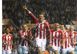 Peter Crouch City goal Stoke Signed 16 x 12 inch football photo. Good Condition. All signed pieces