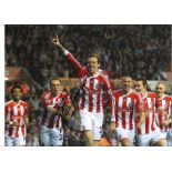 Peter Crouch City goal Stoke Signed 16 x 12 inch football photo. Good Condition. All signed pieces