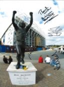 B Leeds multi Leeds United Signed 16 X 12 inch football photo. Good Condition. All signed pieces