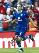 Phil Jagielka Everton Signed 16 x 12 inch football photo. Good Condition. All signed pieces come