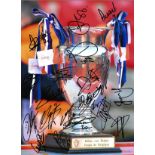 Brugge multi signed 16 x 12 colour football photo. Good Condition. All signed pieces come with a