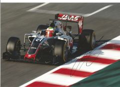 Esteban Ocon signed 12x8 colour in action photo. Good Condition. All signed pieces come with a