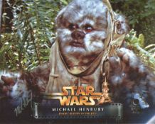 Star Wars. Nice 8x10 photo signed by Star Wars actor Michael Henbury as an Ewok in Return of the