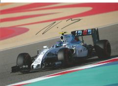 Valteri Bottas signed 12x8 colour in action photo. Good Condition. All signed pieces come with a