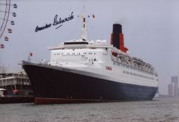 Cunard QE2. 8x12 inch photo signed by the last captain of the QE2, Commodore R.W Warwick. Good
