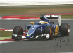 Marcus Ericsson signed 12x8 colour in action photo. Good Condition. All signed pieces come with a
