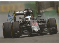Fernando Alonso signed 12x8 colour in action photo. Good Condition. All signed pieces come with a