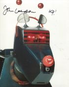 Doctor Who 8x10 inch photo scene signed by actor John Leeson as K9. Good Condition. All signed