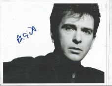 Peter Gabriel signed 10 x 8 inch b/w music photo. Good Condition. All signed pieces come with a