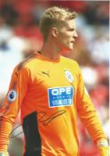 Football Jonas Lossl signed 12x8 colour photo pictured playing for Huddersfield Town. Good