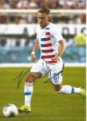 Football Tyler Boyd signed 12x8 colour photo pictured in action for the USA. Good Condition. All