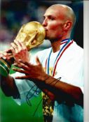 Football Frank Leboeuf 12x8 signed colour photo pictured with the World Cup trophy while playing for